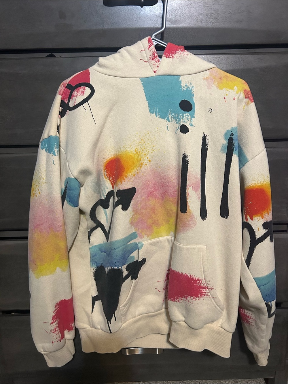 Graffiti-Print Hoodie with Colorful Spray Paint Design
